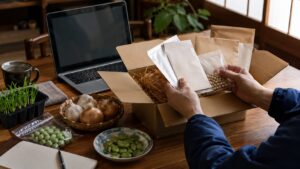 通販で届いた秋冬野菜の種やニンニクを確認する様子